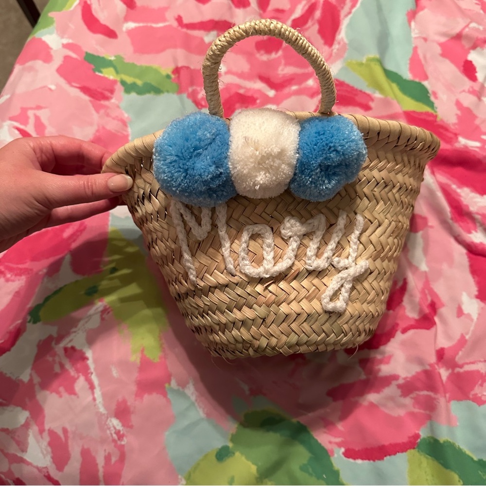 Blue and white straw bag with “Mary”